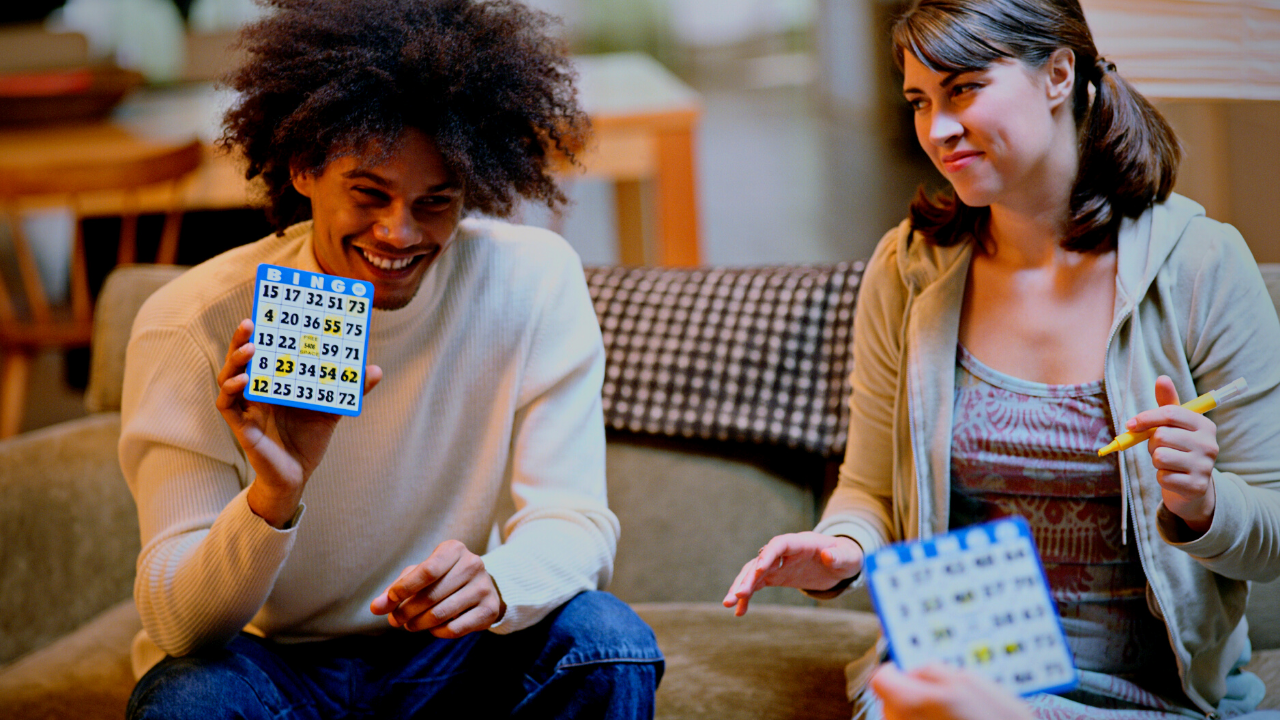 Two people playing bingo.