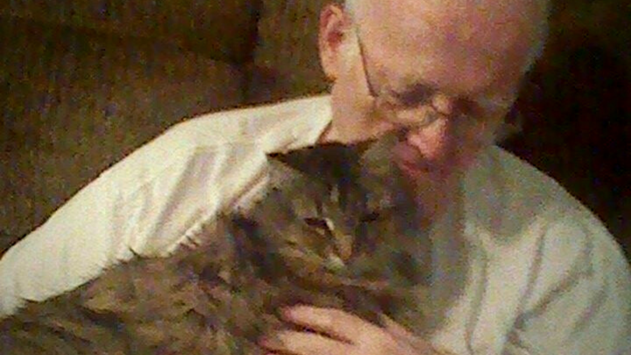 Dr. Mednick and his Maine Coon cat, Gypsy 