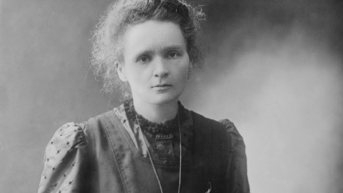 A portrait of Marie Curie.