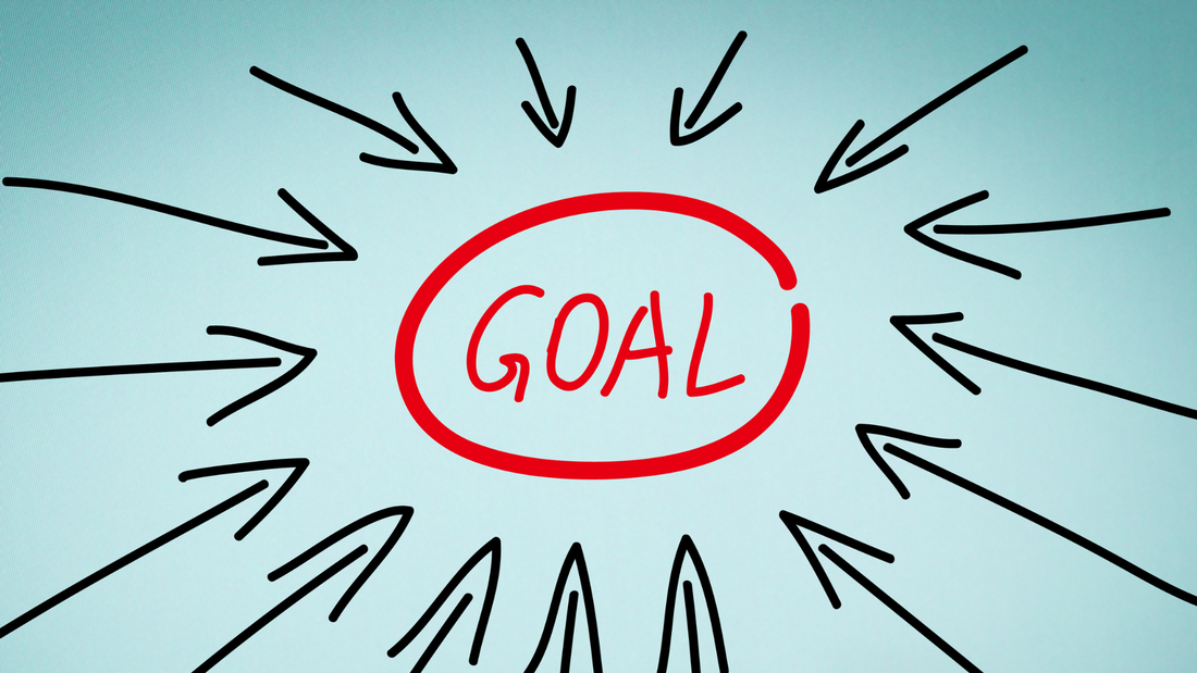 The word Goal with arrows pointing at it.