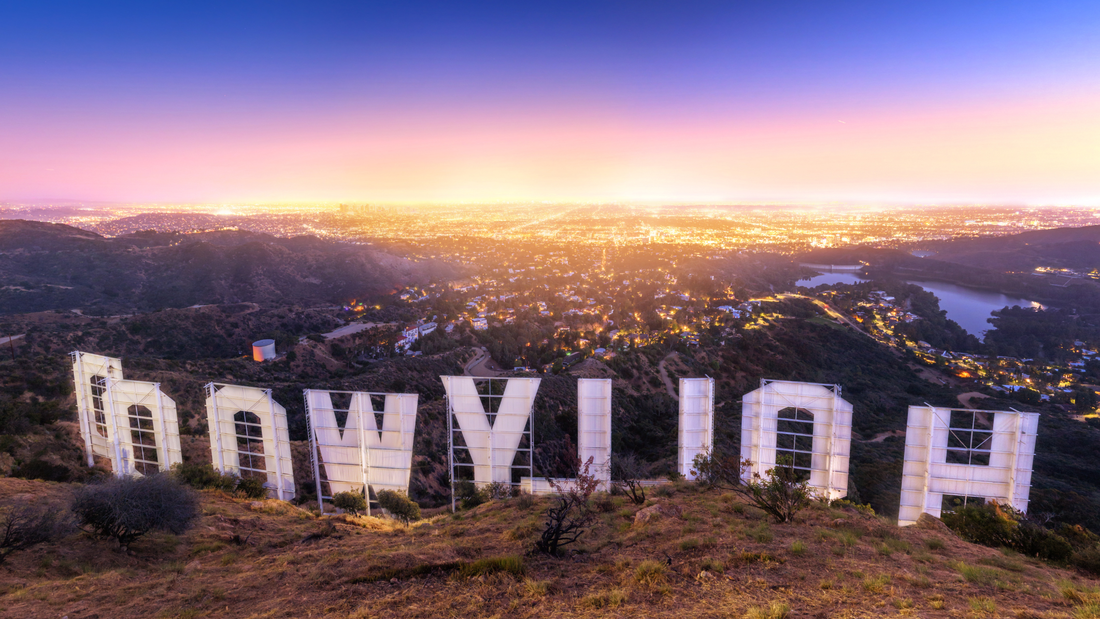 A picture from behind of the Hollywood sign, looking over the city.
