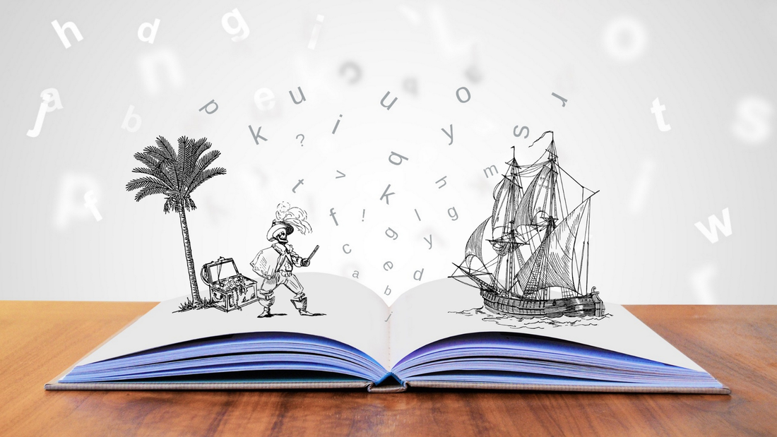 A book sits open on a table, with images popping out of it, of a pirate and a pirate ship. Fascinating!