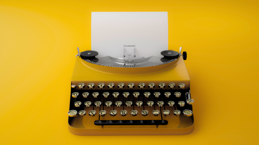 A yellow typewriter, with he word 